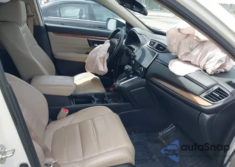 2017 Honda Crv Touring z USA, uszkodzony, nr VIN 5J6RW2H92HL011865